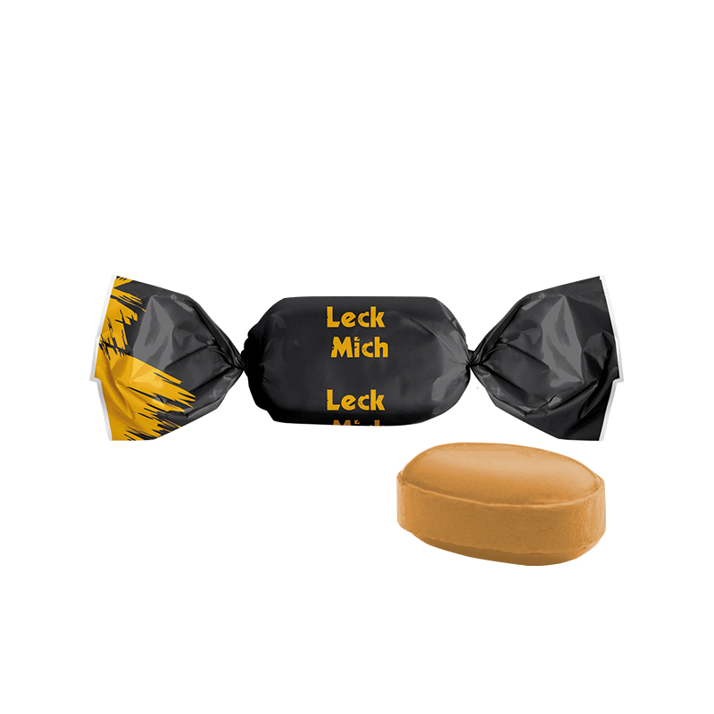 Karamell Bonbon im weißen kompostierbaren Wickler Karamell Bonbon im weißen kompostierbaren Wickler