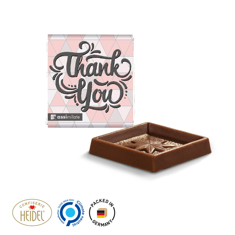 Quadrat Täfelchen in Pergaminpapier Alpenvollmilch Quadrat Täfelchen in Pergaminpapier Alpenvollmilch